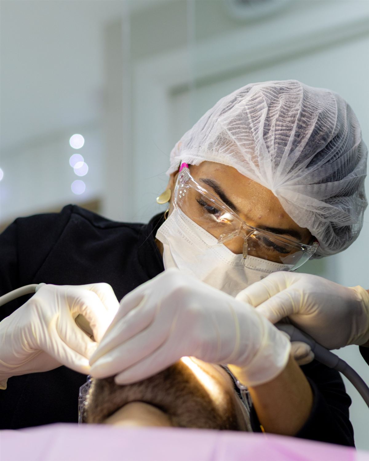 Dr. Marcela Lopes performing surgery